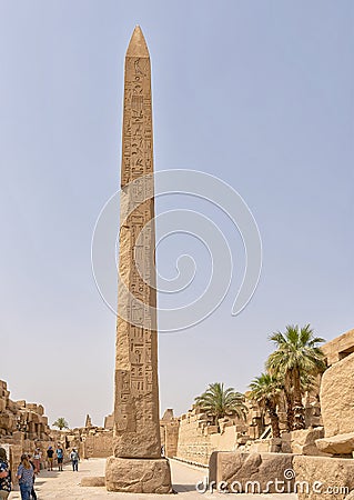 Thutmose I Obelisk with the 3rd Pylon and Amenhotep III Court in the background in the Karnak Temple complex near Luxor, Egypt. Editorial Stock Photo
