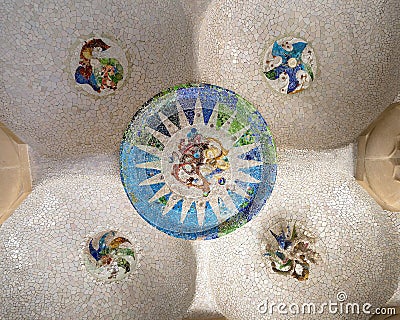 Tile-shard mosaics by Josep Maria Jujol garnishing the ceiling of the Hypostyle Room in Park Guell in Barcelona, Spain. Editorial Stock Photo