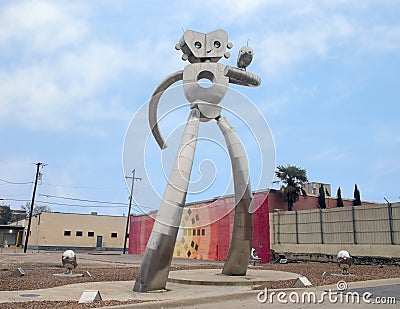 Traveling man stainless steel scupture, Deep Ellum, Dallas, Texas Editorial Stock Photo