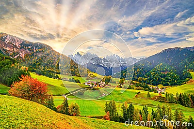 Colorful autumn scenery in Santa Maddalena village at sunrise. Dolomite Alps, South Tyrol, Italy Stock Photo