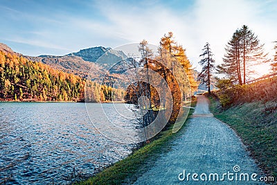 Picturesque autumn sunset on Sils Lake / Silsersee. Spectacular evening view of Swiss Alps, Maloja Region, Upper Engadine, Switzer Stock Photo