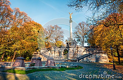 Picturesque autumn view of Angel of Peace Friedensengel monument, park statue of a golden angel on a column is a monument to Stock Photo