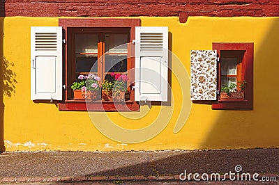 Picturesque facade of old building in Kaysersberg, Alsace, France Stock Photo