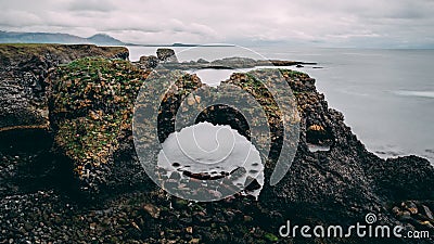 Picturesque Gatklettur arch rock near Hellnar, National park Snaefellsnes Peninsula, Iceland beautiful landscape Stock Photo