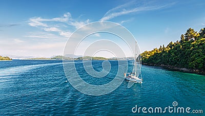 Picturesque Greece landscape with yacht during sunset. Wonderful colorful seascape. Sailing ship yachts with white sails at opened Editorial Stock Photo