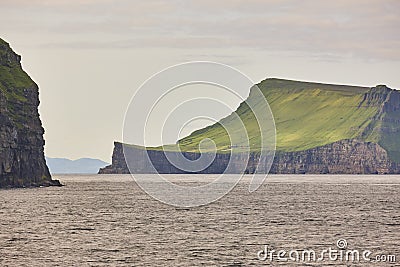 Picturesque green cliffs landscape and atlantic ocean. Faroe islands. Stora Dimun Stock Photo