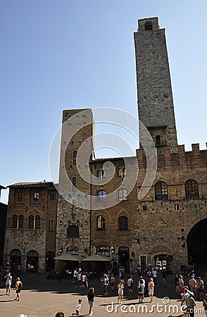 Hstoric Buildings from Plazza del Duomo Square in the Medieval San Gimignano hilltop town. Tuscany region. Italy Editorial Stock Photo