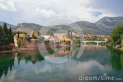 Picturesque landscape with mountains and ancient city on bank of river. Bosnia and Herzegovina, Trebinje Stock Photo