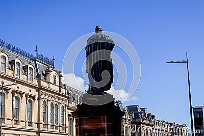 Picturesque monument stands proudly amongst the tall, modern buildings Editorial Stock Photo