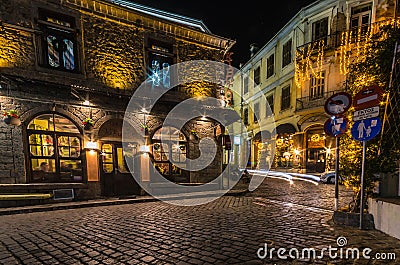 Picturesque narrow alley and neoclassical buildings in old town of Xanthi. Editorial Stock Photo