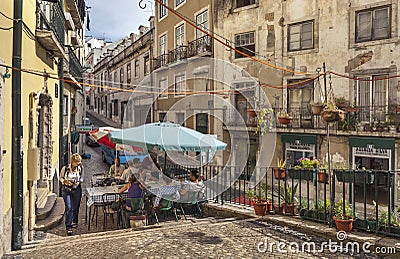 Picturesque narrow street in Alfama district, Lisbon, Porugal Editorial Stock Photo