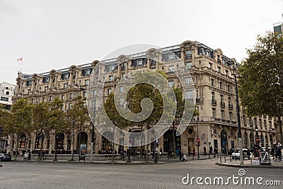 Picturesque Paris buildings in Paris on Avenue des Champs-Ã‰lysÃ©es in late October Editorial Stock Photo