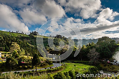 Picturesque park with evaporation from natural active geysers at Stock Photo