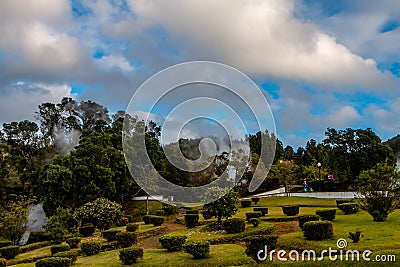 Picturesque park with evaporation from natural active geysers at Editorial Stock Photo