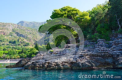 Picturesque rocky coast near famous Royal beach, Milocer, Montenegro Stock Photo