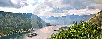 Picturesque sea view of Boka Kotorska, Montenegro, Kotor old town. Shoot from air, from mountain fortification, wide angle, sunset Stock Photo