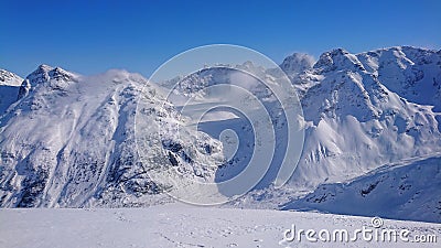 Picturesque shot of windswept peaks of the Canadian Rockies on perfect sunny day Stock Photo