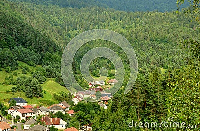 Picturesque small village in a valley surrounded by forests in east Slovakia Stock Photo