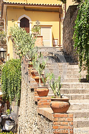 Picturesque staircase in the center of Taormina Stock Photo