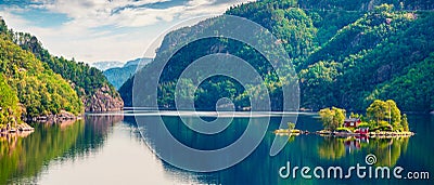 Picturesque summer panorama with small island with typical Norwegian building on Lovrafjorden flord, North sea. Colorful morning Stock Photo