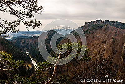 Picturesque Tatry Mountains, Pieniny Mountains and Dunajec River landscape in spring on a cloudy, gloomy day, Malopolska, Poland Stock Photo