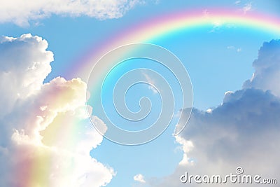 Picturesque view of beautiful rainbow and sky on sunny day Stock Photo