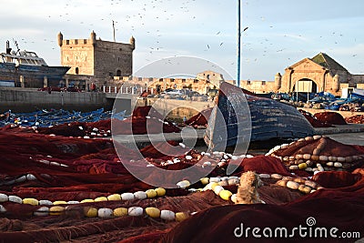 Picturesque View of Colorful and Vibrant Old Essaouira Port, Sqala du Port, a defensive tower, the fishing port Stock Photo