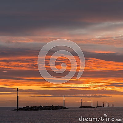 Picturesque view of a stunning tranquil sunrise sky over the Sea Palling Stock Photo