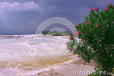 Picturesque view from the white salt mountain in Turkey to the sea in summer Stock Photo