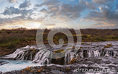 Picturesque waterfall Bruarfoss autumn view. Season changing in southern Highlands of Iceland Stock Photo