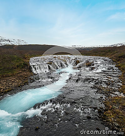 Picturesque waterfall Bruarfoss autumn view. Season changing in southern Highlands of Iceland Stock Photo