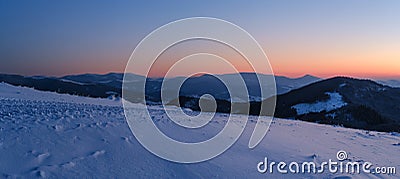 Picturesque winter alps sunrise. Panoramic mountains view from Svydovets ridge and Dragobrat ski resort Stock Photo