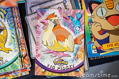 Pidgey, Pokemon playing cards at the flea market. Editorial Stock Photo