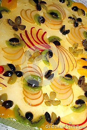 Pie decorated with many fruits Stock Photo