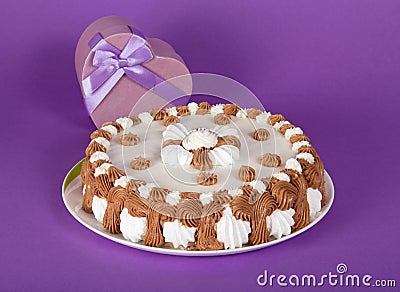 Pie on dish and gift heart Stock Photo