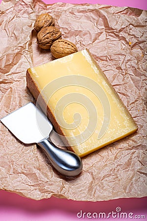 Piece of aged Comte or Gruyere de Comte, AOC French cheese made Stock Photo