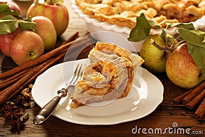 Piece of an apple pie on a plate Stock Photo