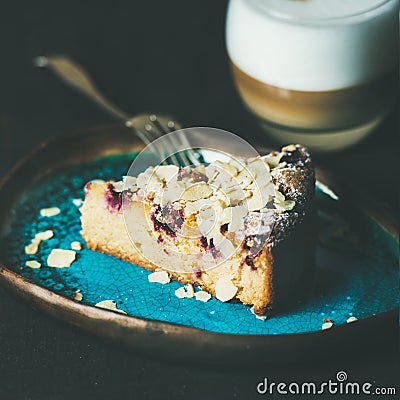 Piece of cake and glass of latte, square crop Stock Photo