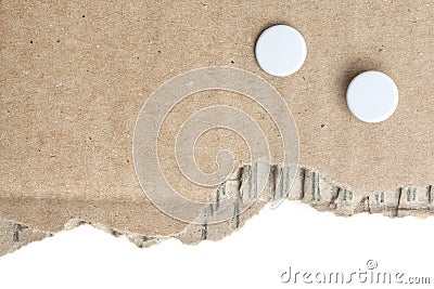 Piece of cardboard with punch holes Stock Photo