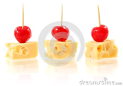 Piece cheese with cocktail cherry Stock Photo