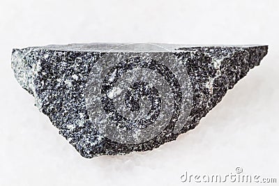 piece of dolerite (diabase) stone on white Stock Photo