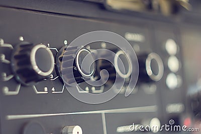 Piece of electrical audio equipment with knobs Stock Photo