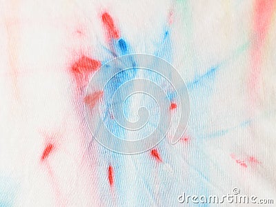A piece of fabric painted in tie dye style. Stock Photo