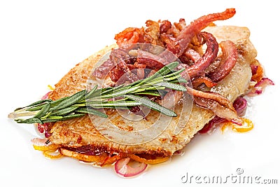 Piece of fillet on a plate decorated with a sprig of rosemary, Stock Photo