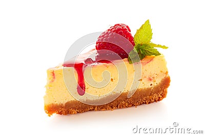 Piece of homemade cheesecake decorated with raspberries and mint on white Stock Photo