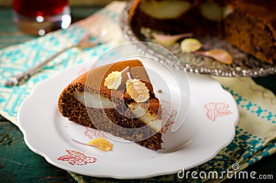 Piece of homemade chocolate cake with pears Stock Photo