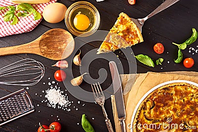 A piece Homemade quiche lorraine with chicken, mushrooms and che Stock Photo