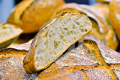 Piece of a loaf of white bread is a loaf of white bread Stock Photo