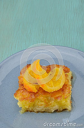 Piece of orange pie Stock Photo