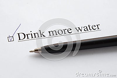 A piece of paper with the inscription drink more water from to do list Stock Photo